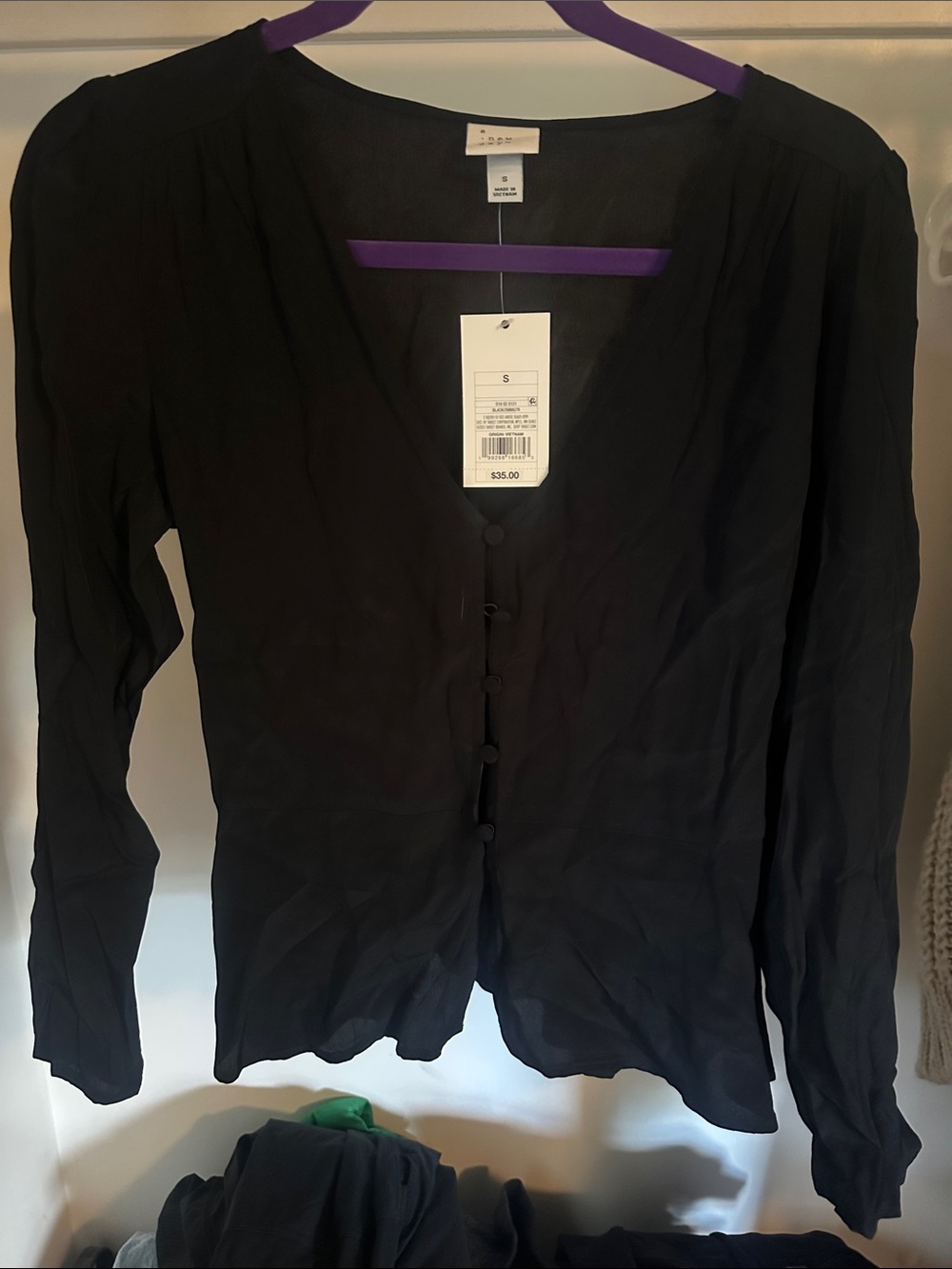 Women’s Black button up blouse with peplum bottom